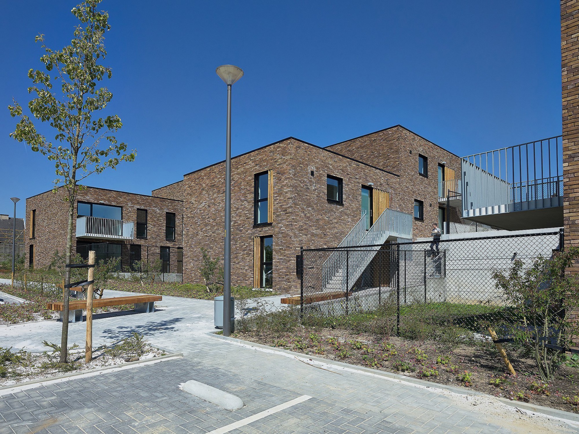 Afbeelding: Fotografie architectuur 40 sociale woningen, Schepdaal, voor  © atelier M Architects + Planners.